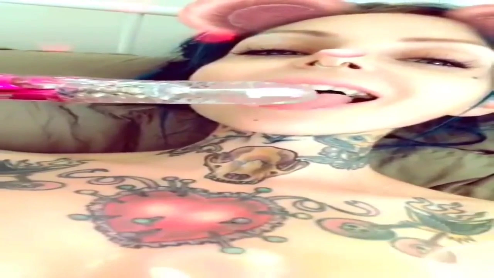naughty onlyfans babe Riae practicing dildo sucking with her glass toy while showing off her big boobs also