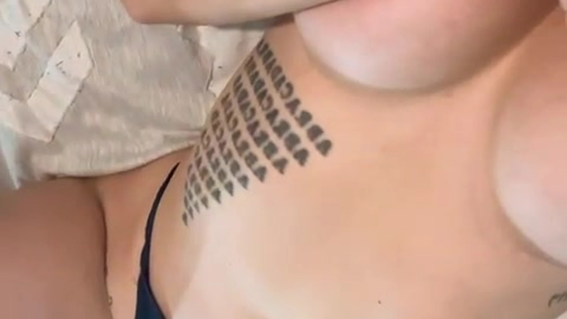 busty goddess Merisiel Irum taking shots of her huge tits on cam